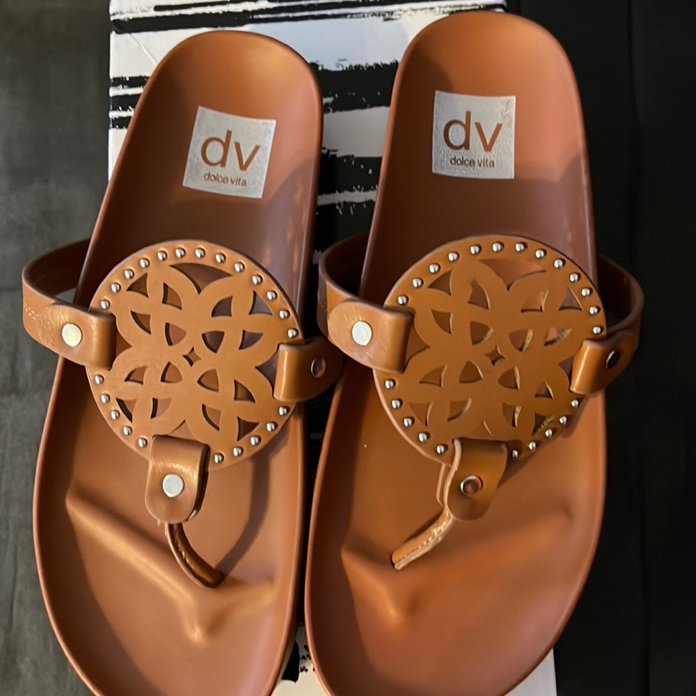 Dolce Vita New.  They feel so good.  They were too big for me.
